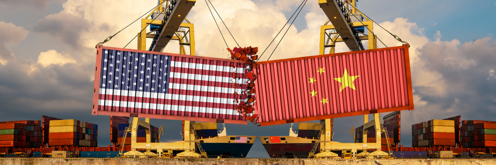 Collision of shipment containers with Chinese and US flags